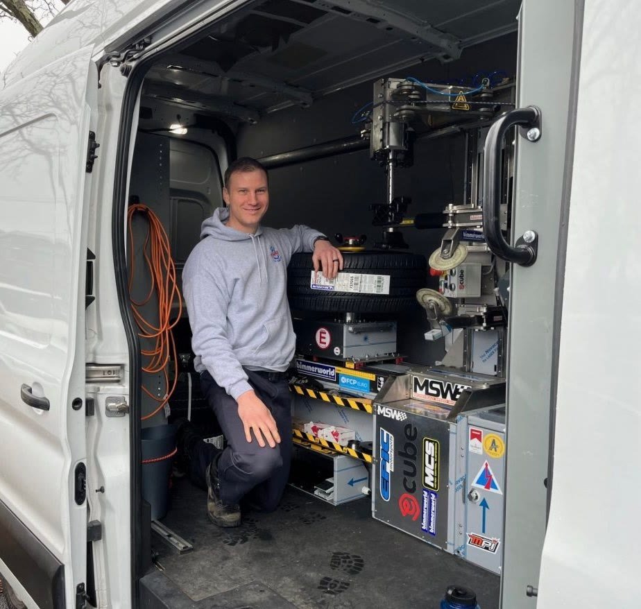 OBG Mobile Tire Service van interior with a tire changer